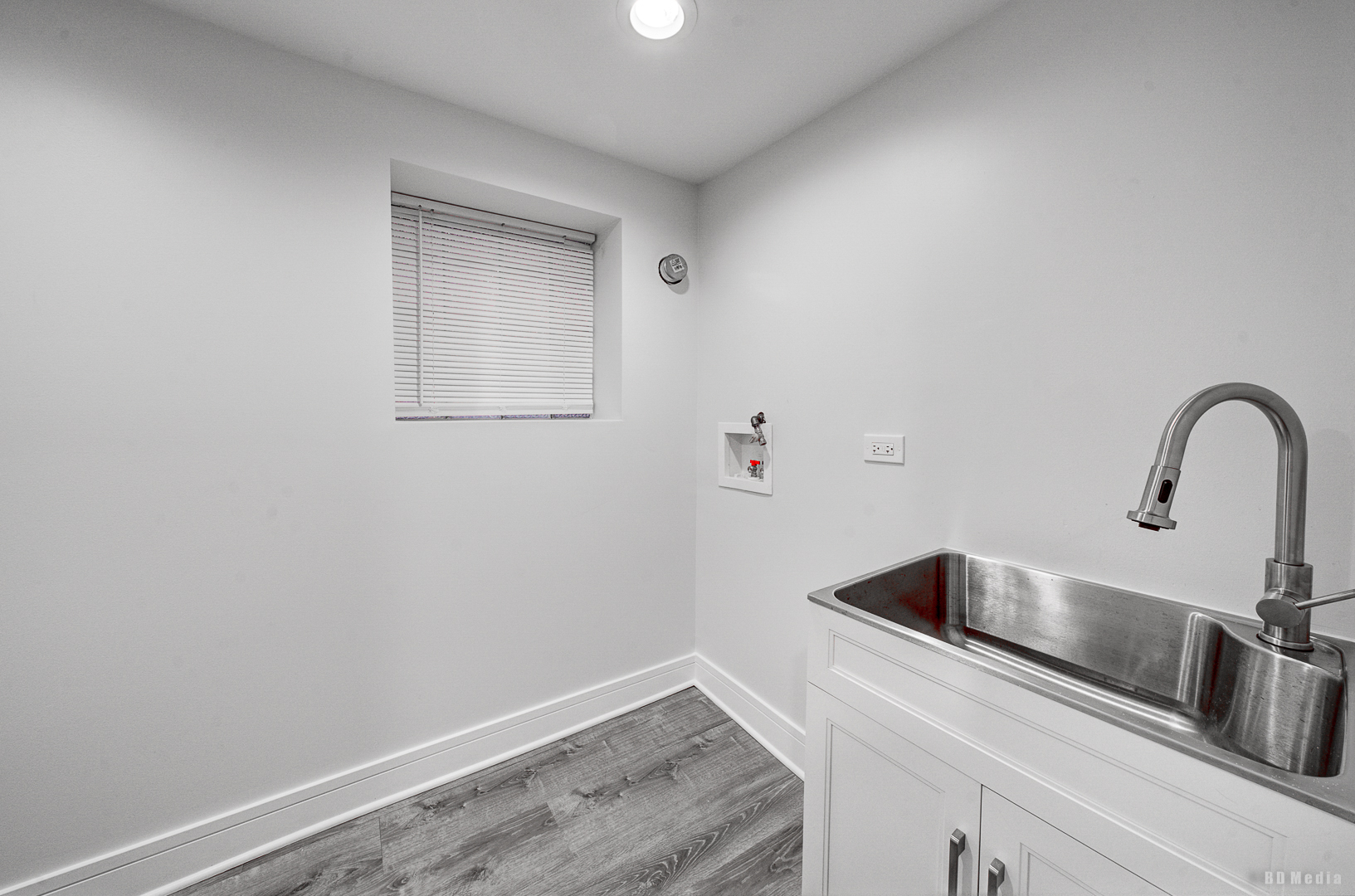 7307 South Peoria Street Chicago, IL 60621 - Photo 31 of 45 a close view of sink and tap