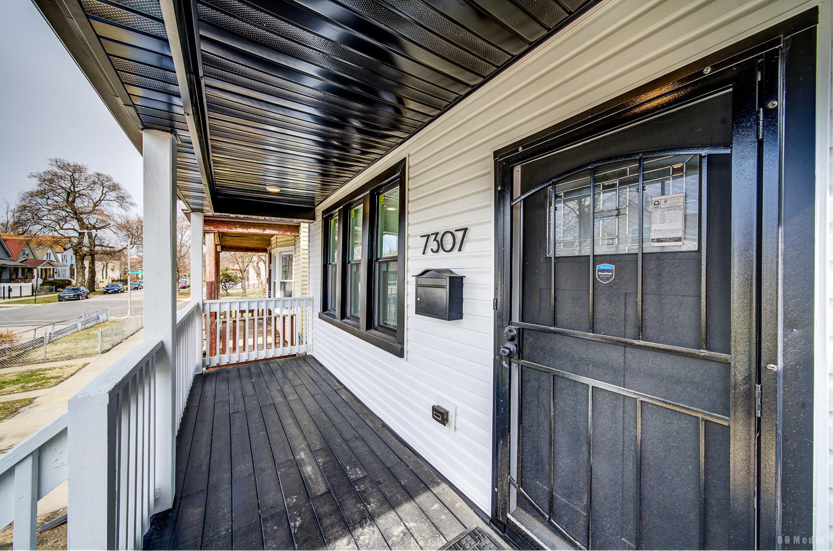 7307 South Peoria Street Chicago, IL 60621 - Photo 5 of 45 a view of a house with wooden floor