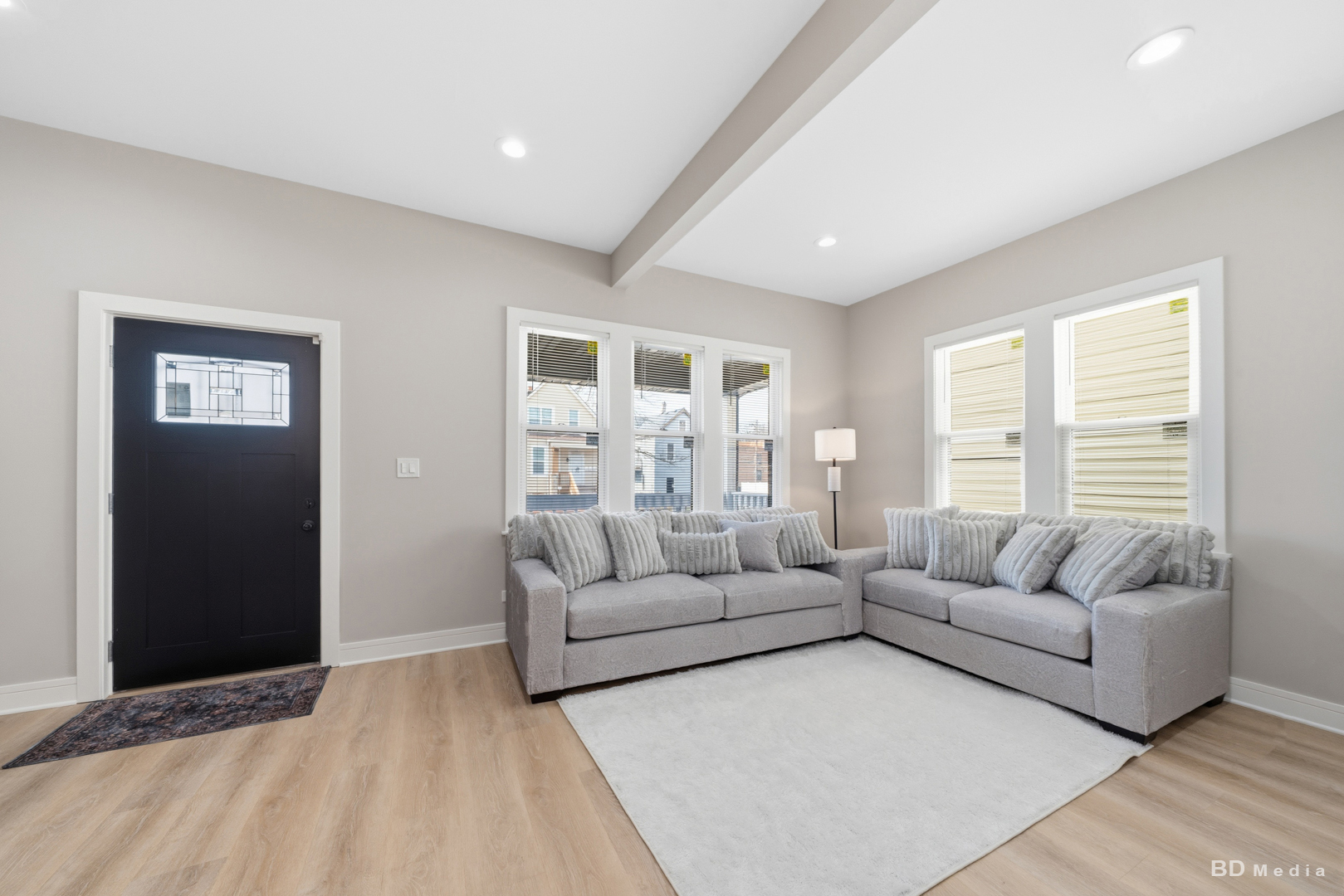 7307 South Peoria Street Chicago, IL 60621 - Photo 8 of 45 a living room with furniture and a large window