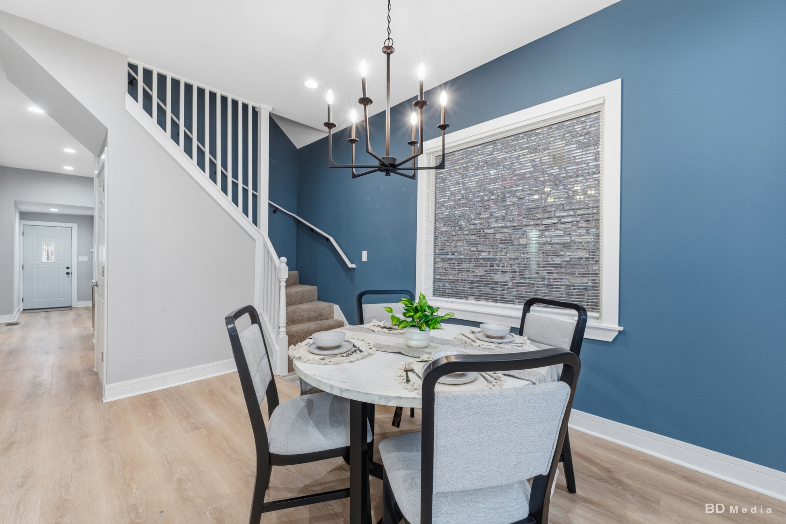 7307 South Peoria Street Chicago, IL 60621 - Photo 9 of 45 a view of a dining room with furniture window and wooden floor