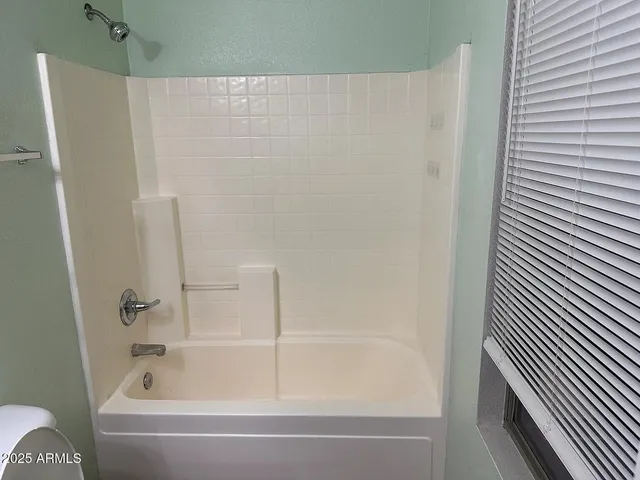 a bathroom with a bathtub