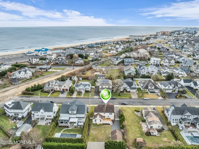 an aerial view of a city with lawn chairs