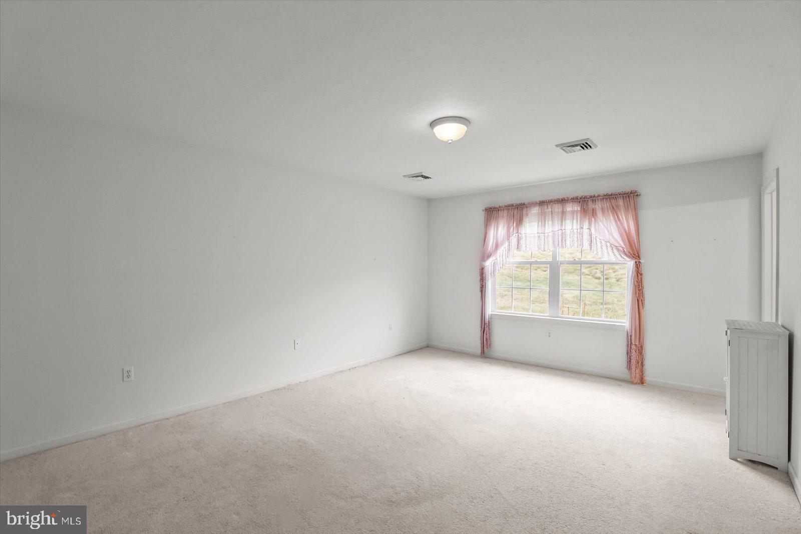 7150 Seneca Ridge Drive York, PA 17403 - Photo 18 of 32 an empty room with windows