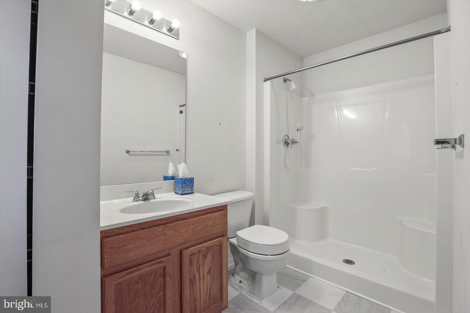 7150 Seneca Ridge Drive York, PA 17403 - Photo 21 of 32 a bathroom with a sink a toilet and shower