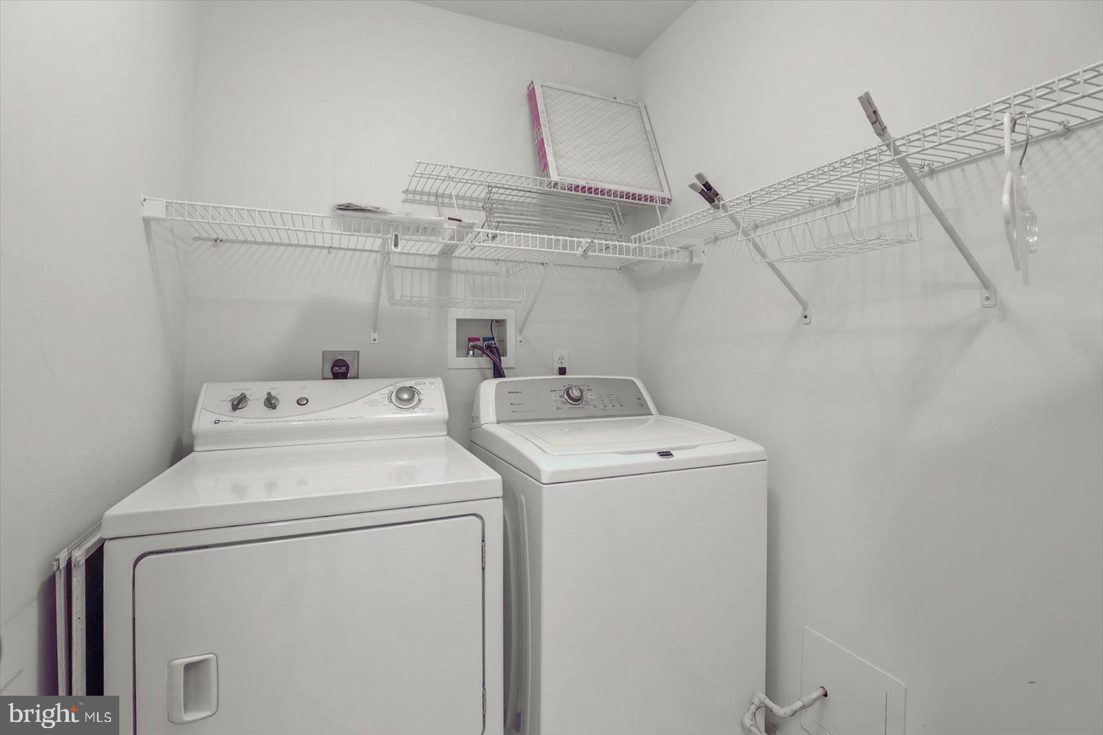 7150 Seneca Ridge Drive York, PA 17403 - Photo 24 of 32 a utility room with dryer and washer