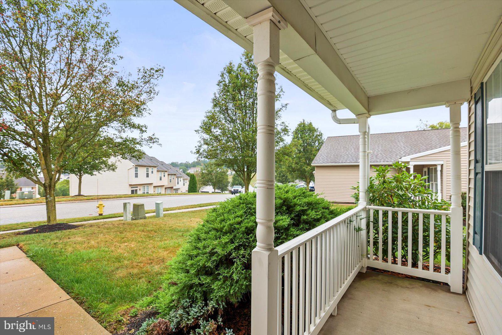 7150 Seneca Ridge Drive York, PA 17403 - Photo 3 of 32 a view of a city from a porch