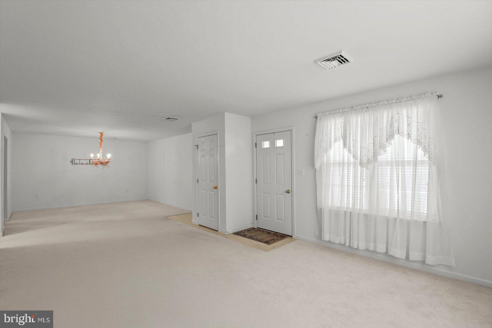 7150 Seneca Ridge Drive York, PA 17403 - Photo 8 of 32 an empty room with windows