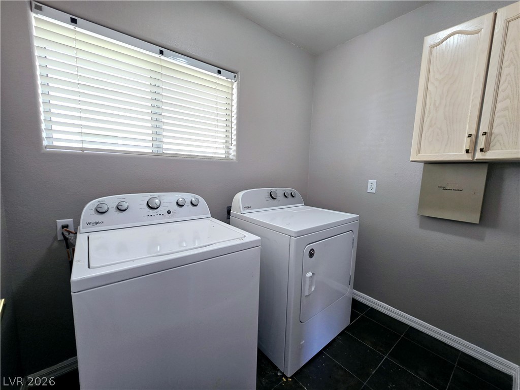 3759 Funston Way Las Vegas, NV 89129 - Photo 28 of 31 Functional laundry room offers a convenient dedicated space for chores with ample cabinetry.