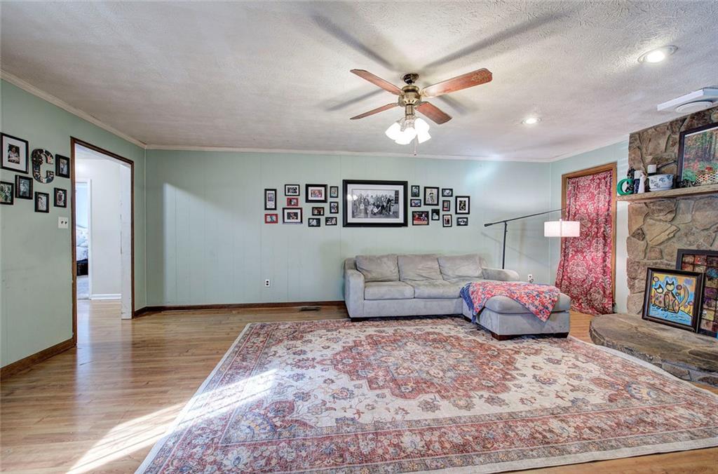 101 Ivy Lane Southeast Cartersville, GA 30121 - Photo 19 of 47 a bedroom with furniture and a chandelier