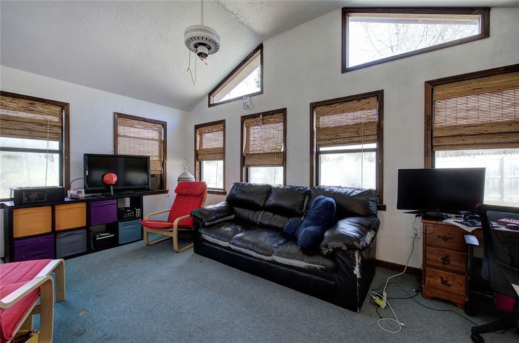 101 Ivy Lane Southeast Cartersville, GA 30121 - Photo 20 of 47 a living room with furniture and a flat screen tv