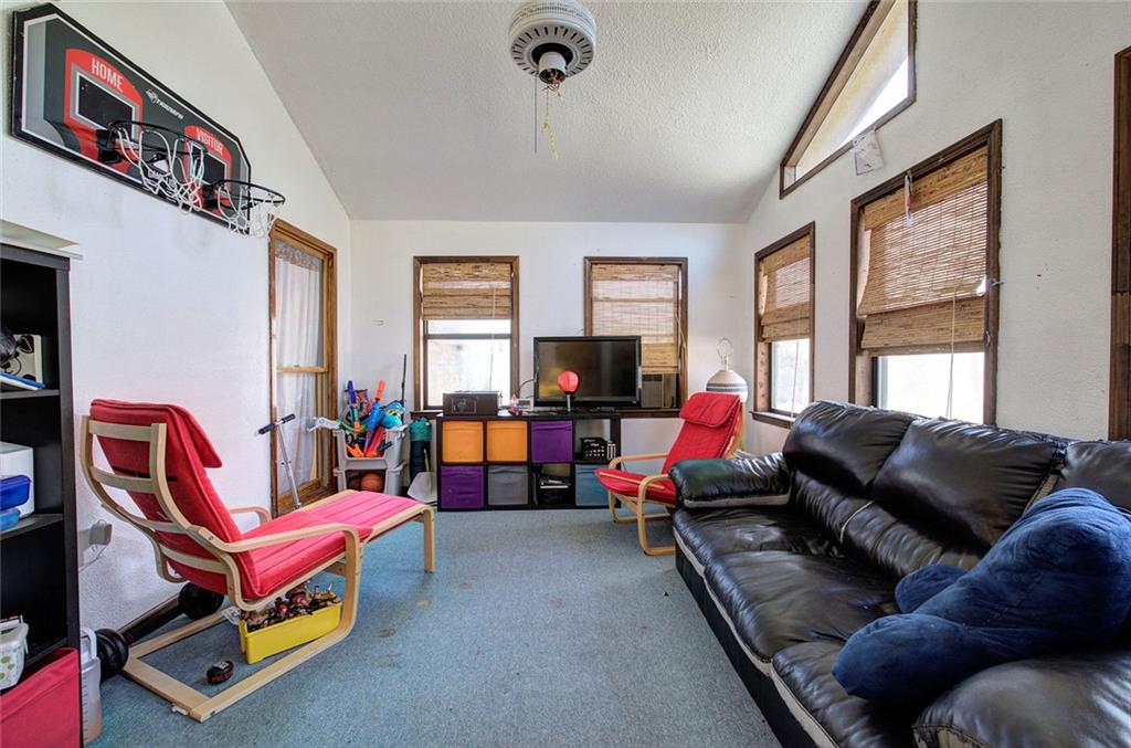 101 Ivy Lane Southeast Cartersville, GA 30121 - Photo 21 of 47 a living room with furniture and a flat screen tv
