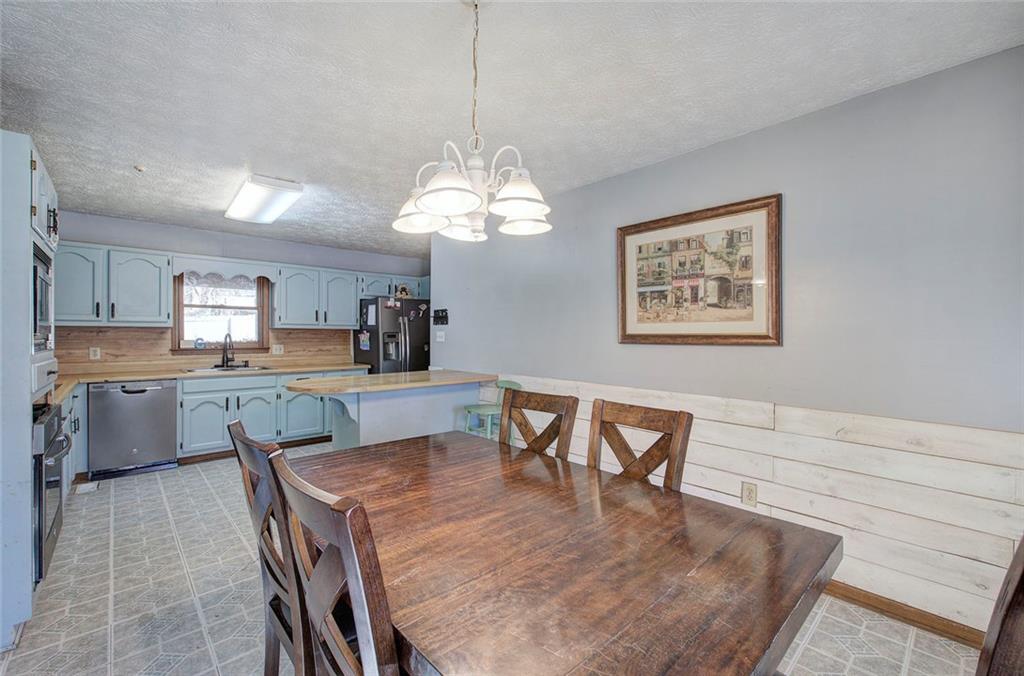101 Ivy Lane Southeast Cartersville, GA 30121 - Photo 24 of 47 a dining room with furniture and window
