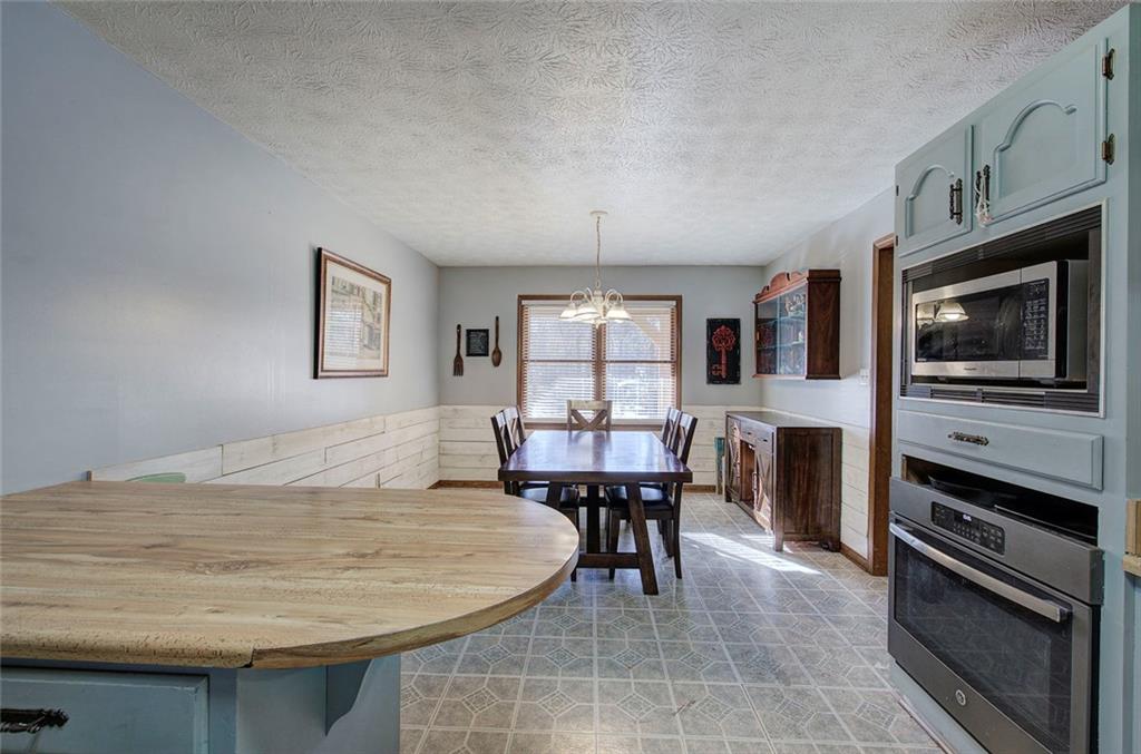 101 Ivy Lane Southeast Cartersville, GA 30121 - Photo 29 of 47 a workspace with furniture window and wooden floor