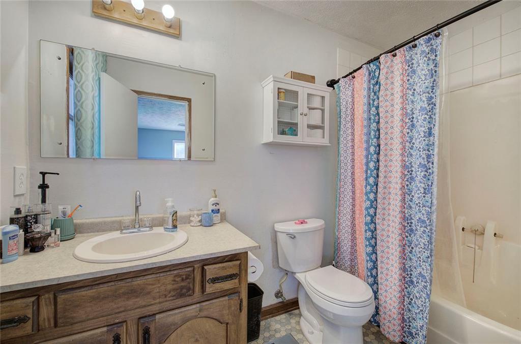 101 Ivy Lane Southeast Cartersville, GA 30121 - Photo 39 of 47 a bathroom with a sink toilet and shower
