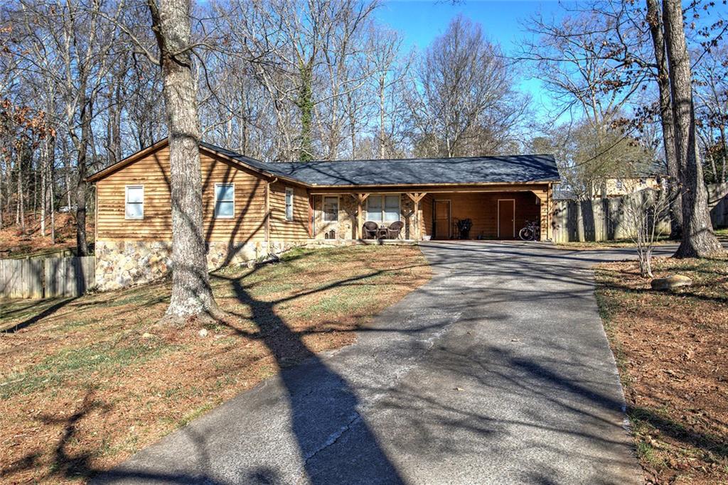 101 Ivy Lane Southeast Cartersville, GA 30121 - Photo 4 of 47 a view of yard along with trees
