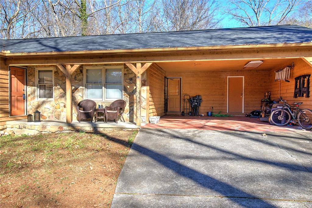 101 Ivy Lane Southeast Cartersville, GA 30121 - Photo 6 of 47 a view of a swimming pool with lounge chair
