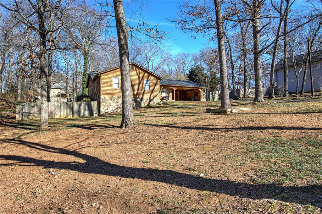 101 Ivy Lane Southeast Cartersville, GA 30121 - Photo 7 of 47 a view of a house with snow on the road