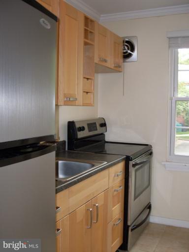 a utility room with cabinets