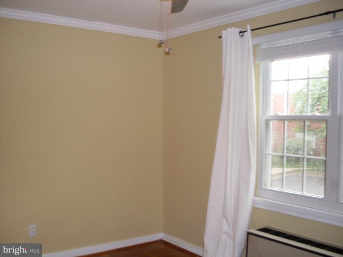 205 East Glebe Road, Unit 6205E Alexandria, VA 22305 - Photo 8 of 13 a small space with a window and a shower