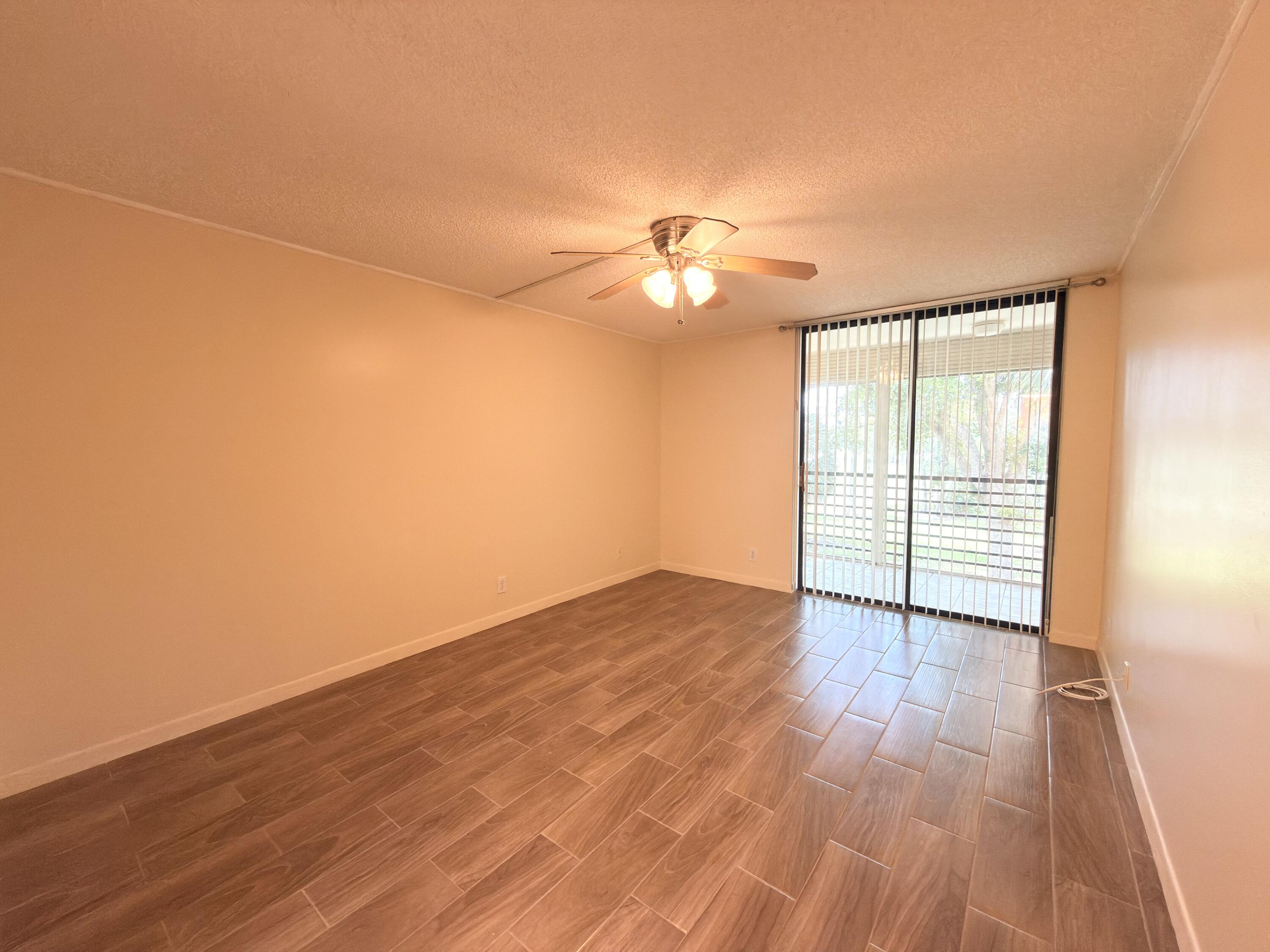 7650 West McNab Road, Unit 210 Tamarac, FL 33321 - Photo 6 of 13 Primary Bedroom