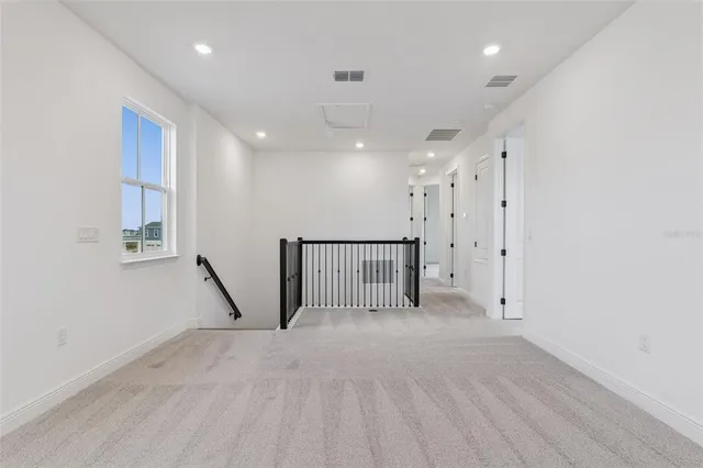 a view of a livingroom with a staircase