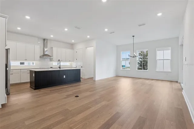a view of kitchen and windows