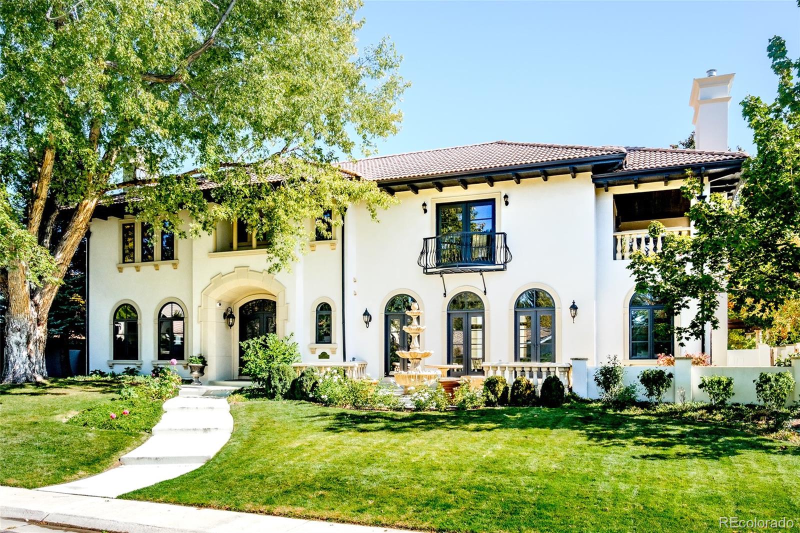 80 South Eudora Street Denver, CO 80246 - Photo 2 of 43 a view of a white house with a yard and plants