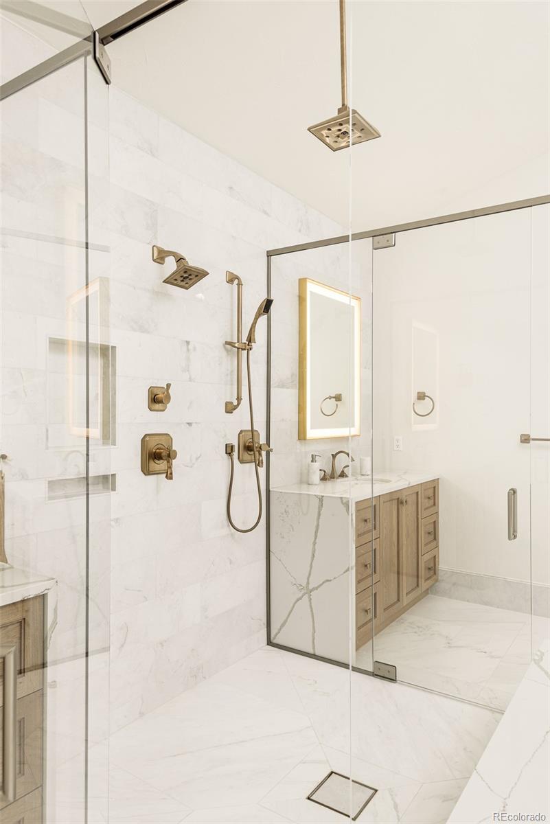 80 South Eudora Street Denver, CO 80246 - Photo 28 of 43 a bathroom with a shower vanity and tub