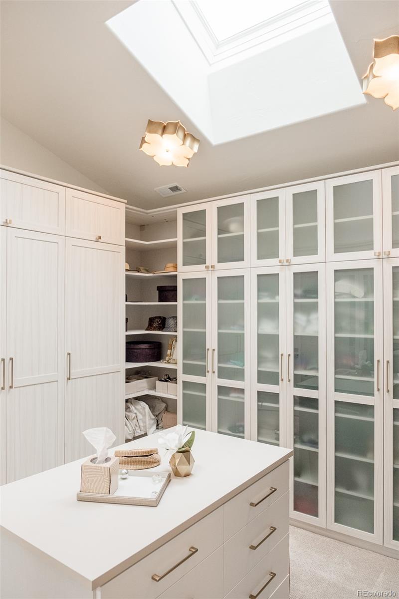 80 South Eudora Street Denver, CO 80246 - Photo 29 of 43 a room with a dresser and a window