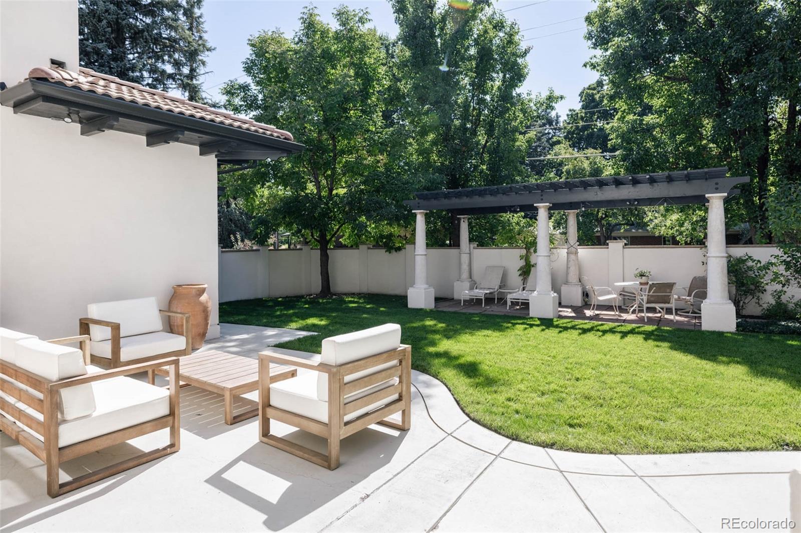 80 South Eudora Street Denver, CO 80246 - Photo 43 of 43 a view of backyard with seating space and trees