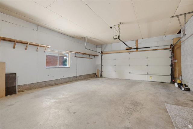 392 Perrine Drive Midvale, UT 84047 - Photo 31 of 37 Extra Long garage