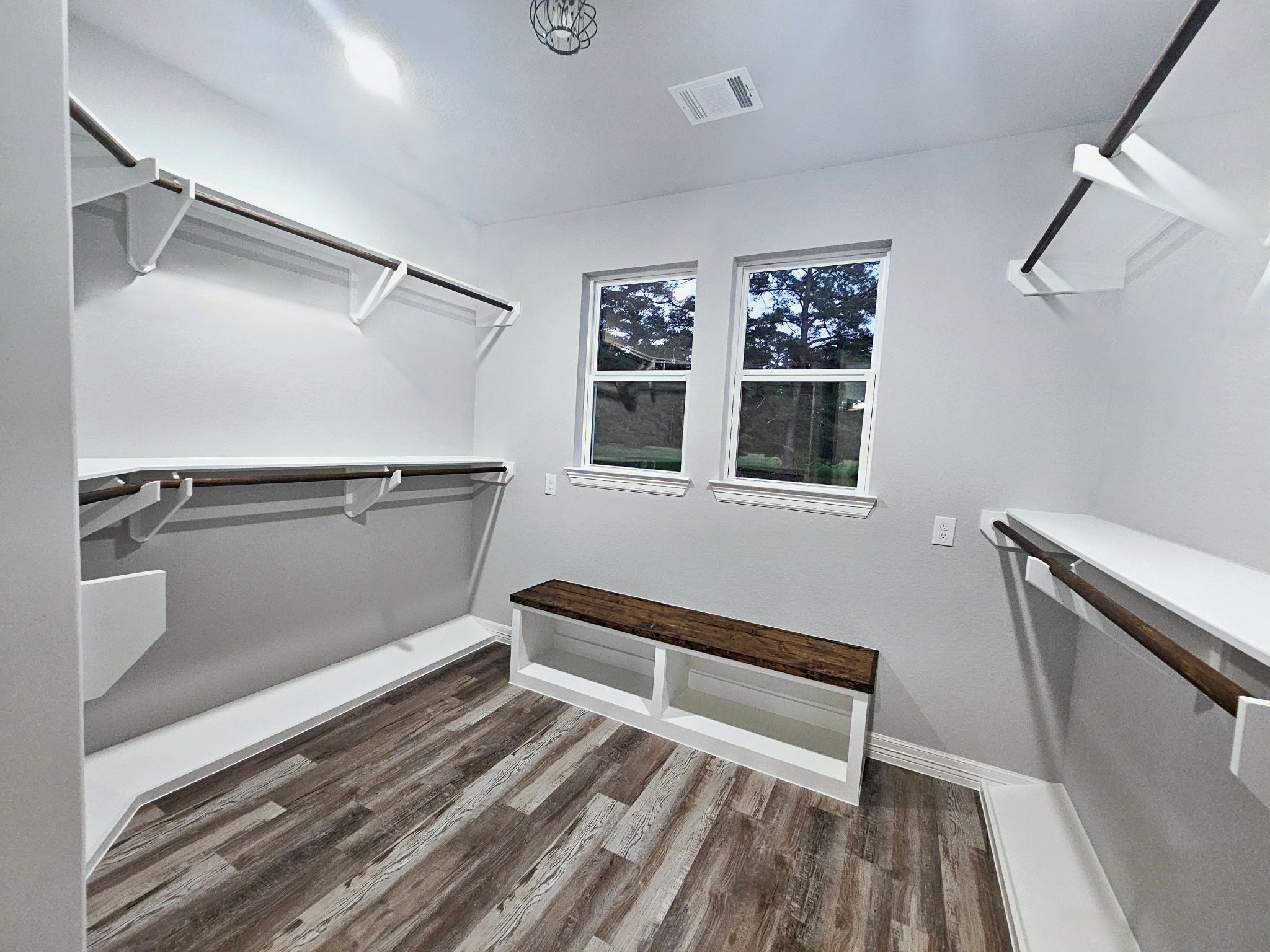 20 Lazy Springs Trinity, TX 75862 - Photo 32 of 37 Featuring ample hanging space, built-in shelving, and a wooden bench.