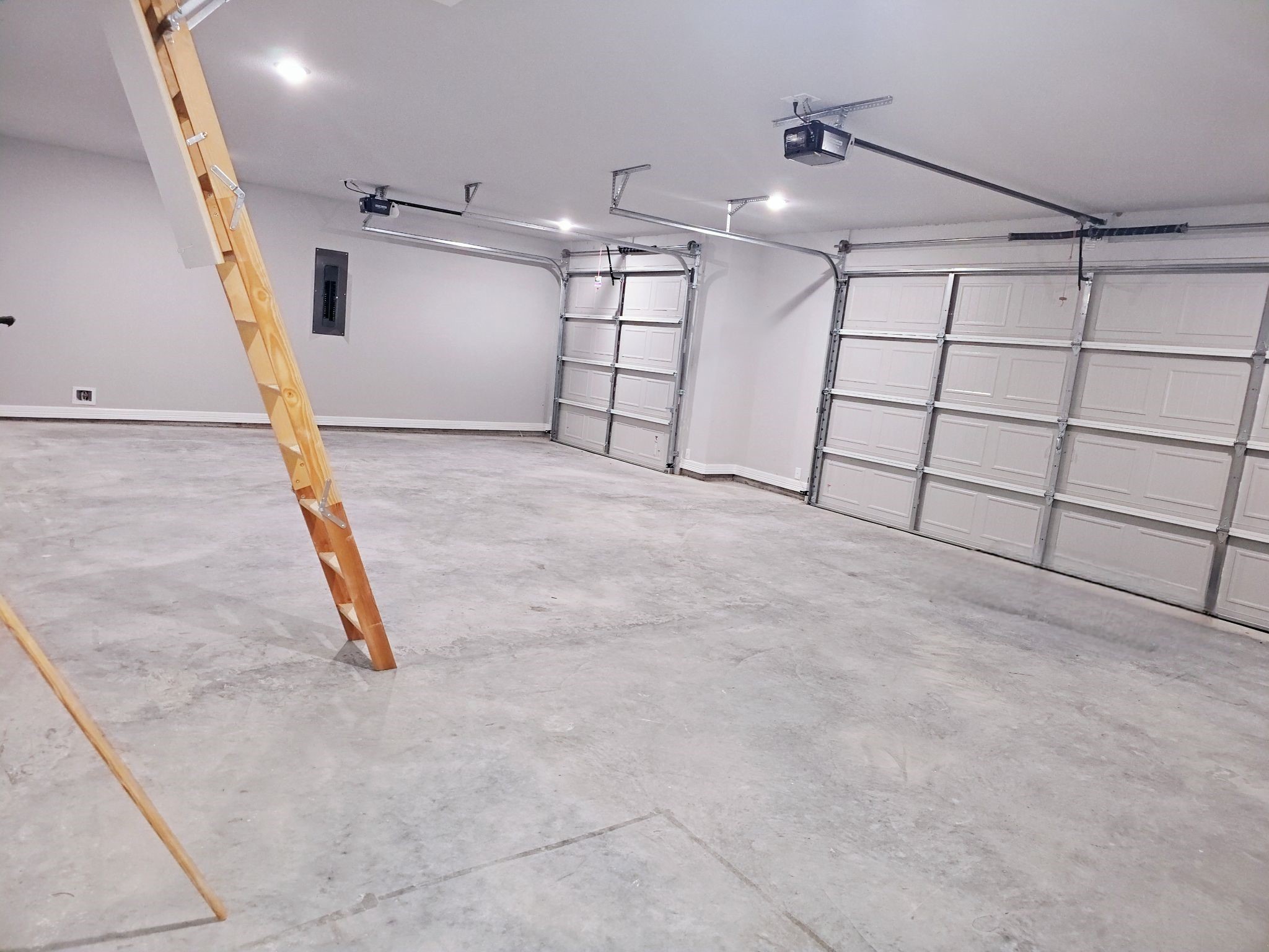 20 Lazy Springs Trinity, TX 75862 - Photo 34 of 37 Spacious three-car garage with an access ladder to the spacious attic.