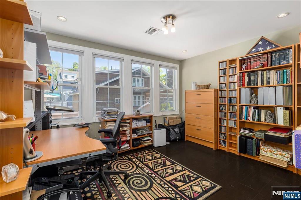 65 Lincoln Avenue Rutherford, NJ 07070 - Photo 26 of 39 a room with furniture toys and a window