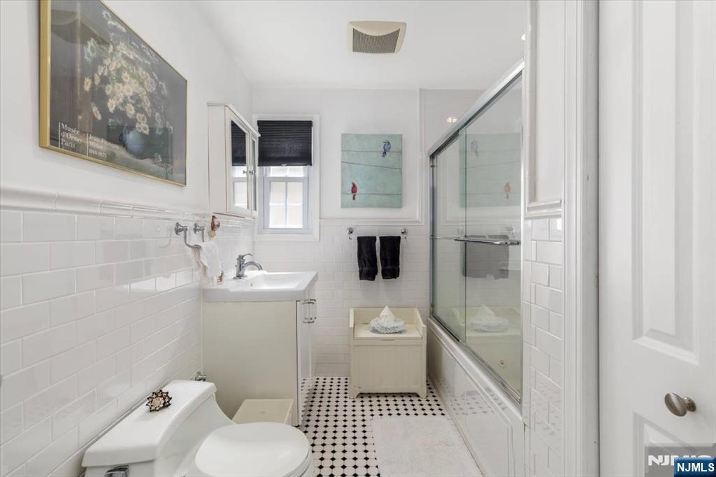 65 Lincoln Avenue Rutherford, NJ 07070 - Photo 27 of 39 a bathroom with a sink toilet and shower