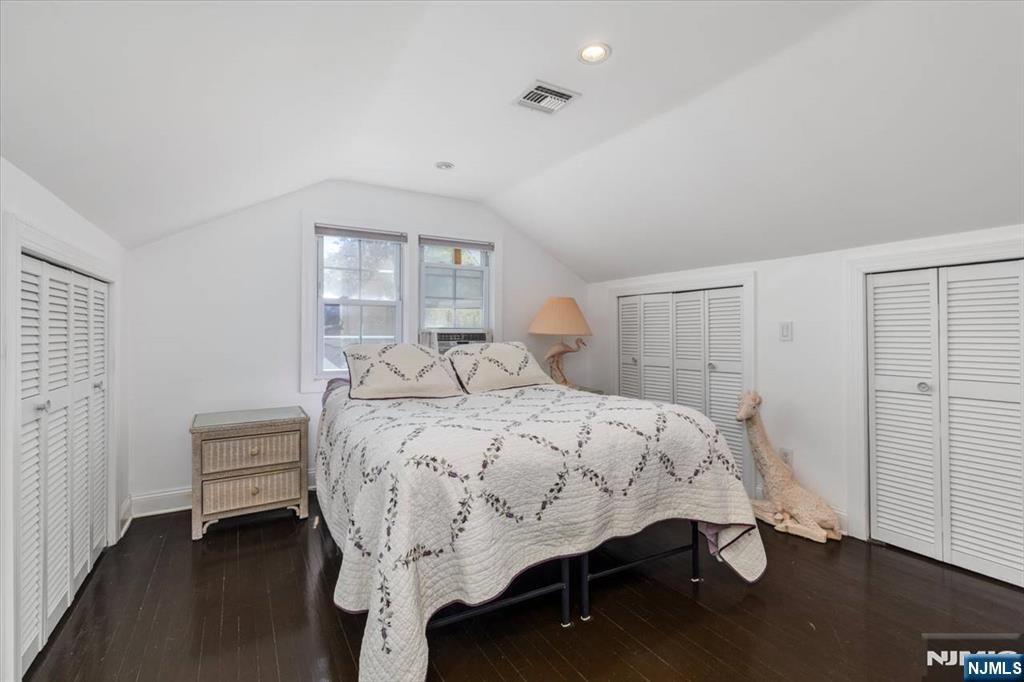 65 Lincoln Avenue Rutherford, NJ 07070 - Photo 28 of 39 a bedroom with a bed and a window