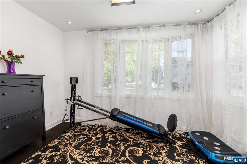 65 Lincoln Avenue Rutherford, NJ 07070 - Photo 8 of 39 a room with furniture and a window