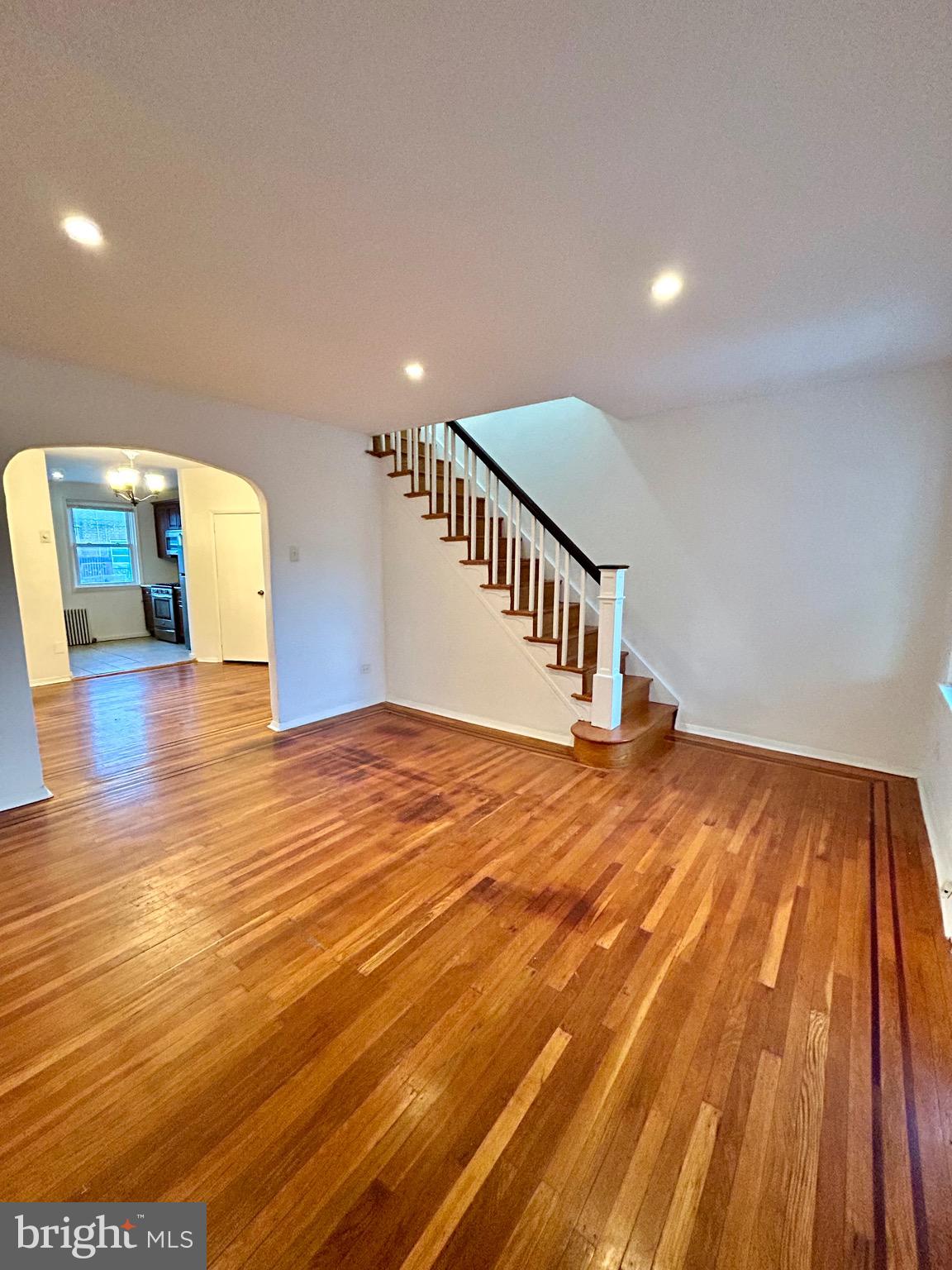 7137 Gillespie Street Philadelphia, PA 19135 - Photo 2 of 2 a view of an empty room with wooden floor