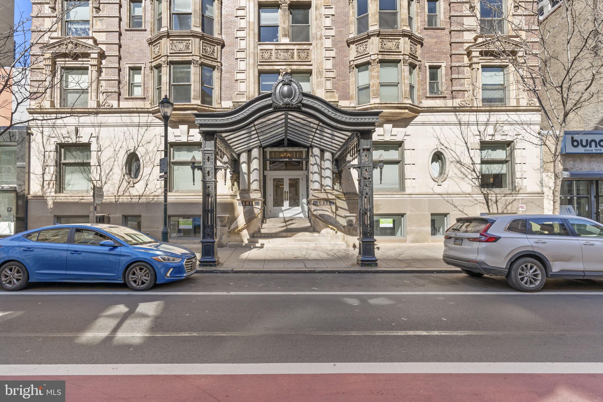 1811 Chestnut Street, Unit 404 Philadelphia, PA 19103 - Photo 1 of 1 a car parked on the side of a building