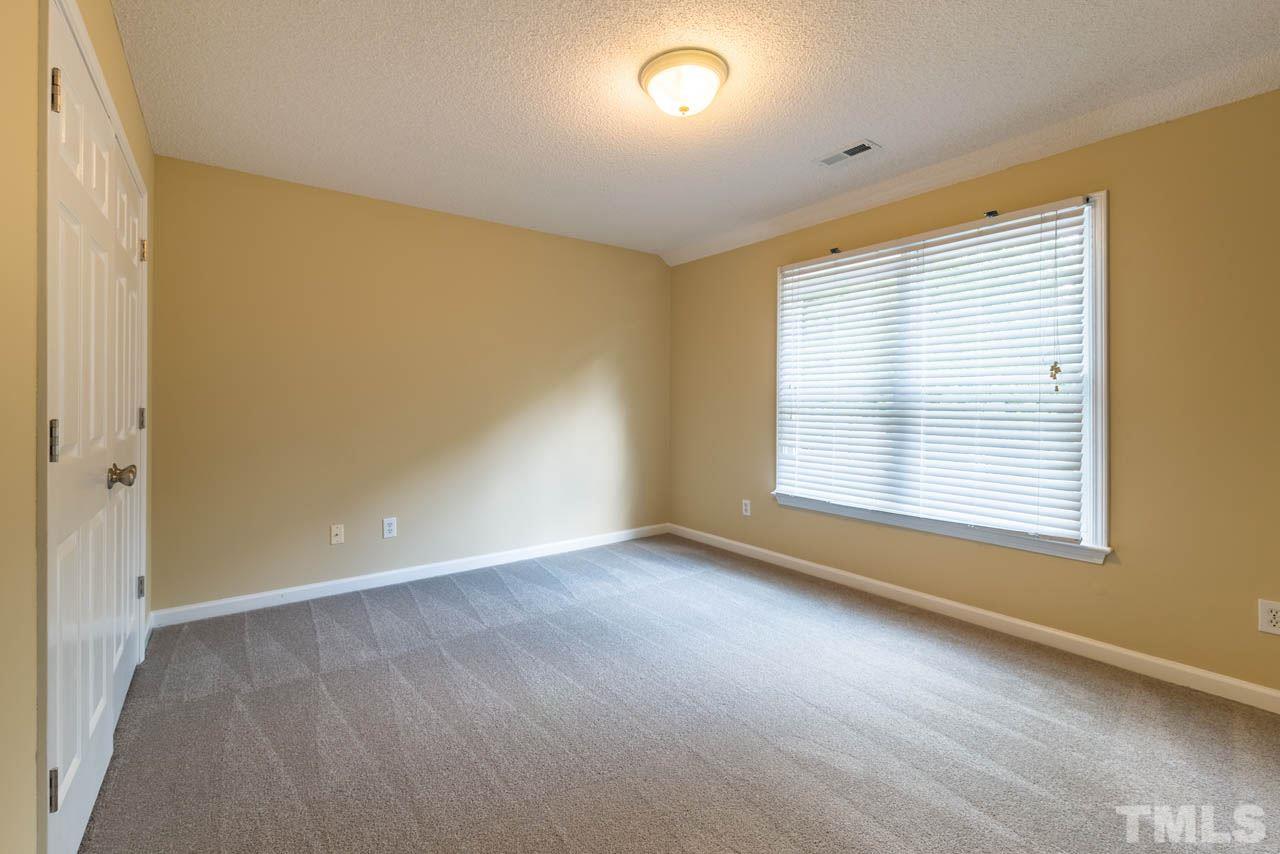 3608 Singleleaf Lane Raleigh, NC 27616 - Photo 11 of 23 an empty room with a empty space and a window