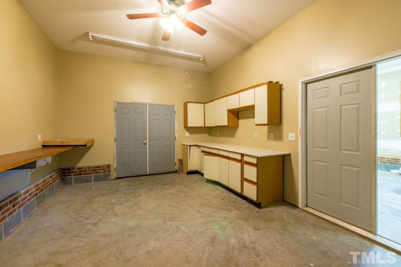 3608 Singleleaf Lane Raleigh, NC 27616 - Photo 17 of 23 a view of a workspace with furniture