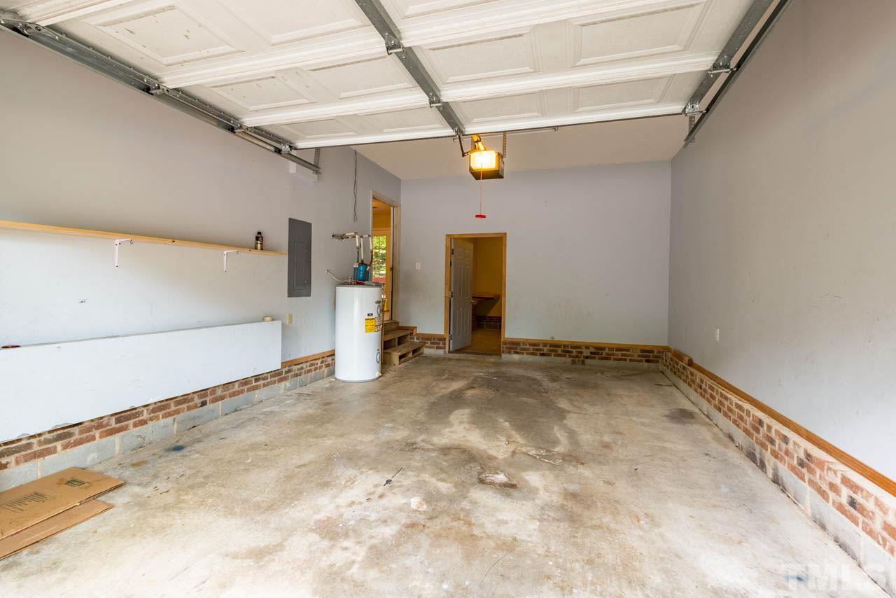 3608 Singleleaf Lane Raleigh, NC 27616 - Photo 20 of 23 a view of a garage