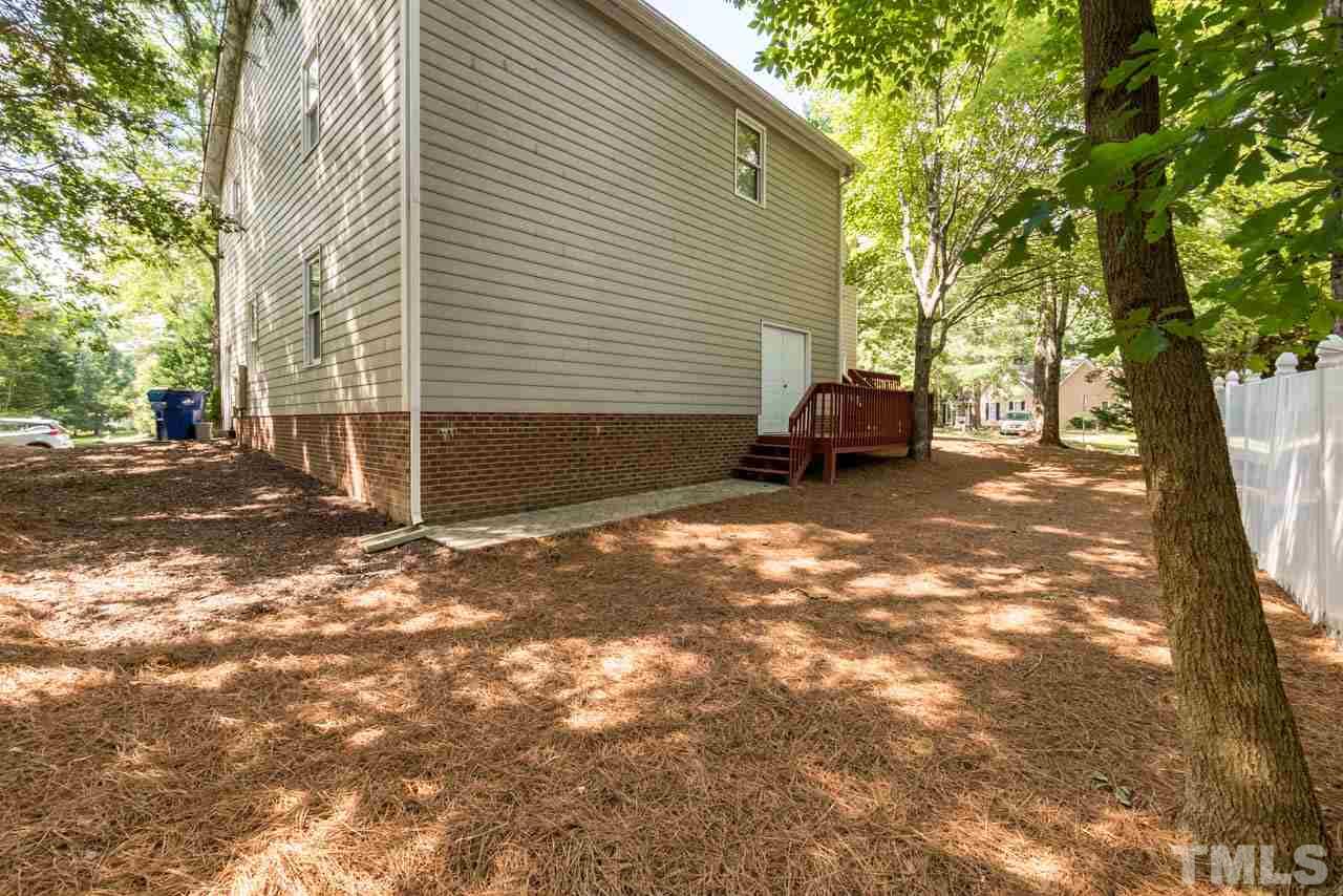 3608 Singleleaf Lane Raleigh, NC 27616 - Photo 21 of 23 a car parked in front of a house
