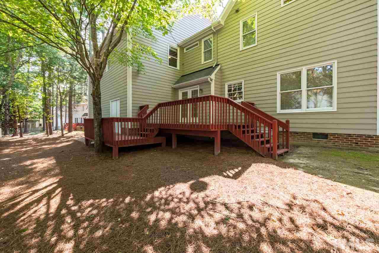 3608 Singleleaf Lane Raleigh, NC 27616 - Photo 22 of 23 a front view of a house with a yard