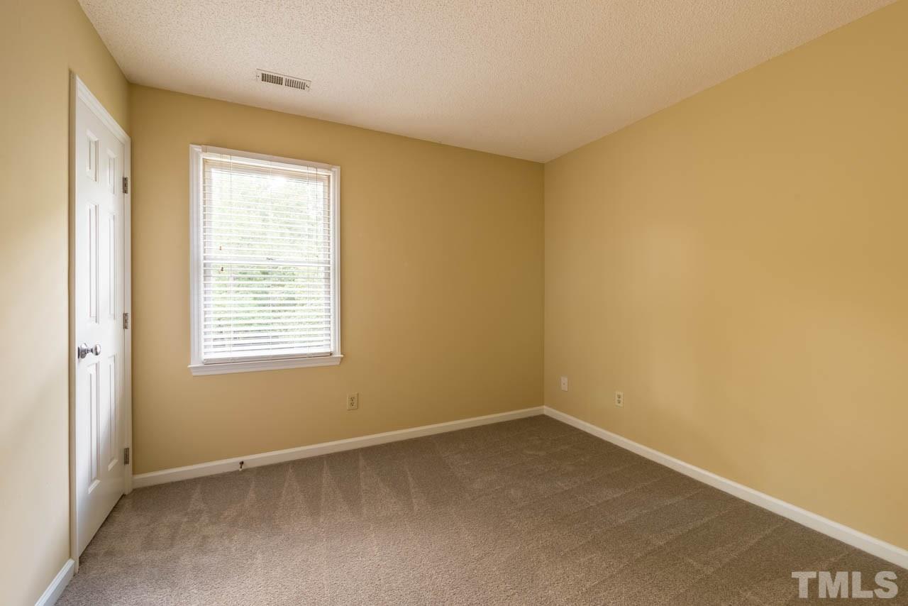 3608 Singleleaf Lane Raleigh, NC 27616 - Photo 10 of 23 an empty room with a window