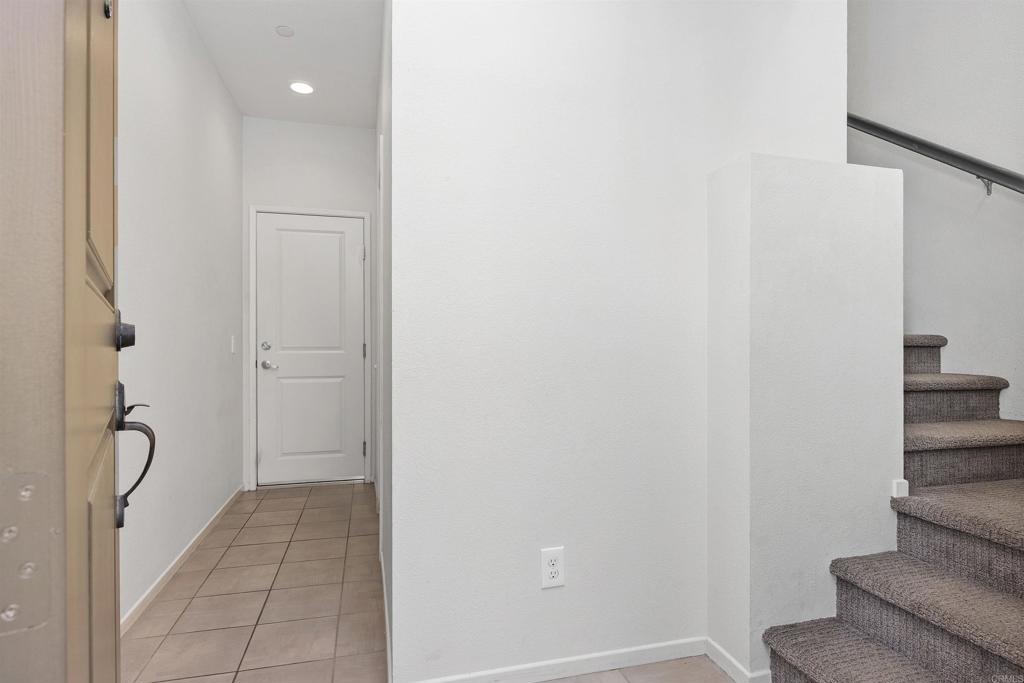 1309 Via Lucero Oceanside, CA 92056 - Photo 19 of 50 a view of a hallway with staircase