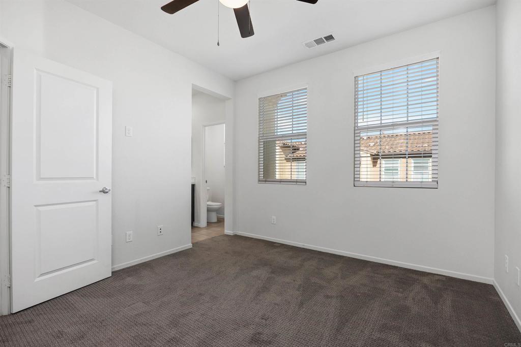 1309 Via Lucero Oceanside, CA 92056 - Photo 21 of 50 a view of an empty room with a window
