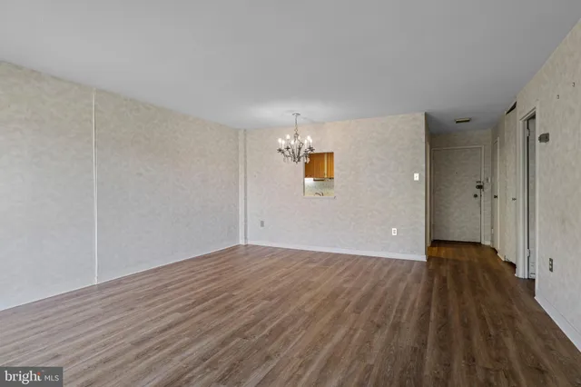a view of a livingroom with wooden floor