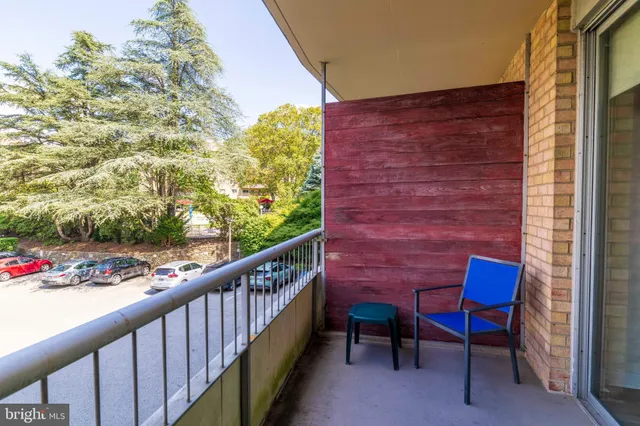 a kitchen with a refrigerator sink and cabinets