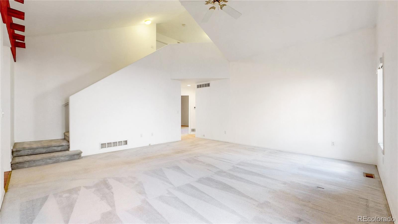 4367 Quail Street Wheat Ridge, CO 80033 - Photo 14 of 50 a view of empty room with a ceiling fan